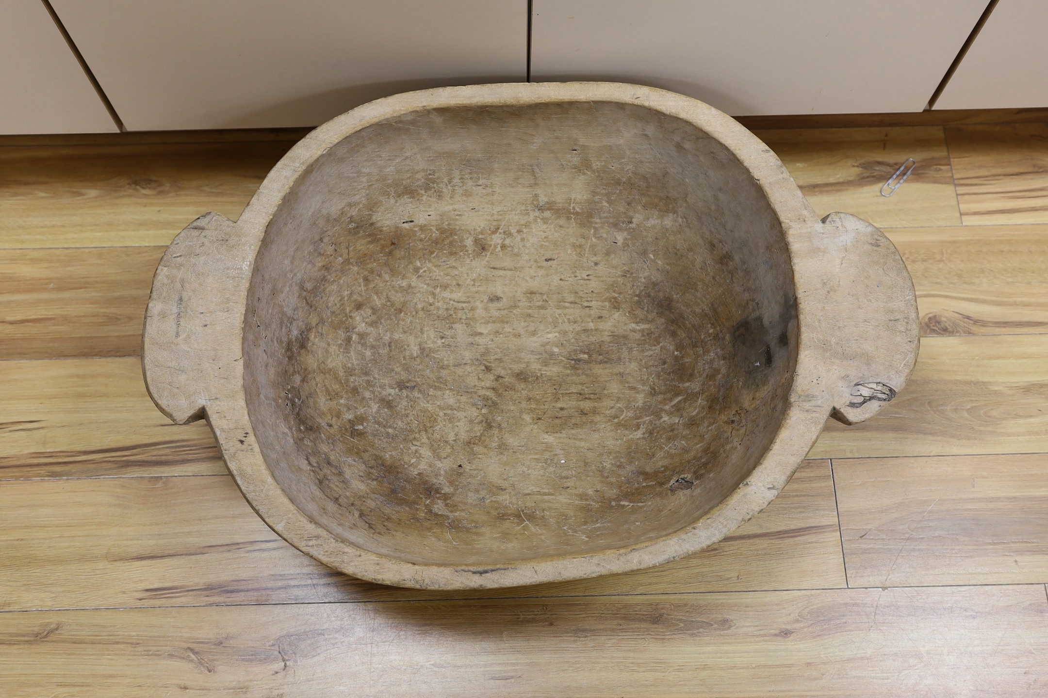 A large 19th century sycamore mixing bowl, 83.5 cms wide.